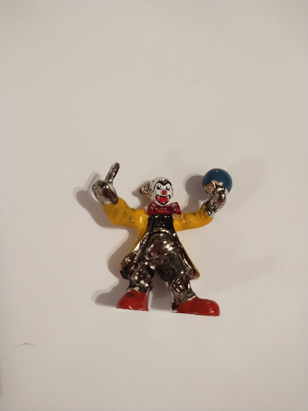 Vintage Pewter Yellow Jacket Clown Figurine Toy with Blue Ball Accessory